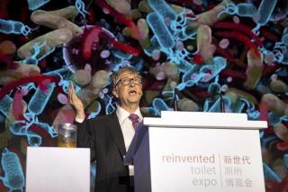 Bill Gates Shares Stage With ... Poop