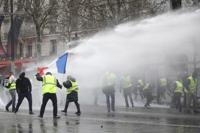 Protesters Slammed With Tear Gas, Water Cannons