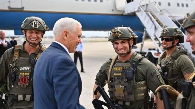 SWAT Member Wears #QAnon Patch With Pence