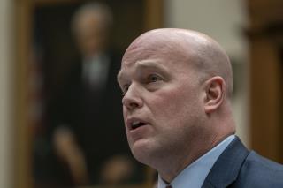 In Testy Hearing, Acting AG Draws Laughter