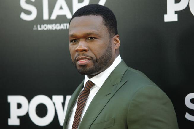 NYPD Officer's Alleged 50 Cent Threat: 'Shoot Him on Sight'