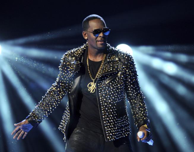 R. Kelly Charged With Sexual Abuse