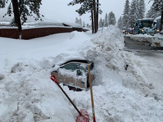 Snowplow Hits Buried Car, Then a Bigger Surprise