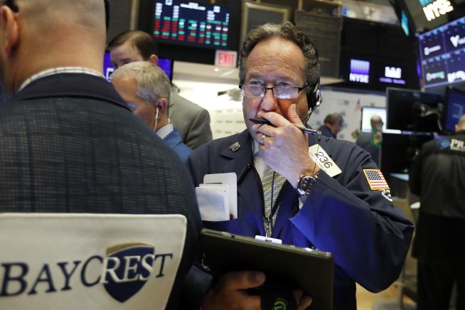 Stocks Give Up Early Gain, Close Lower
