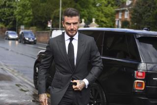 David Beckham Uses Phone While Driving, Now Can't Drive