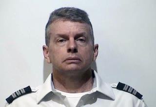 Pilot Arrested at Airport in Triple Homicide
