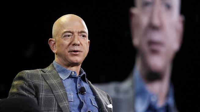 Protester Arrested at Jeff Bezos Conference