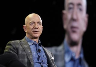 Protester Arrested at Jeff Bezos Conference