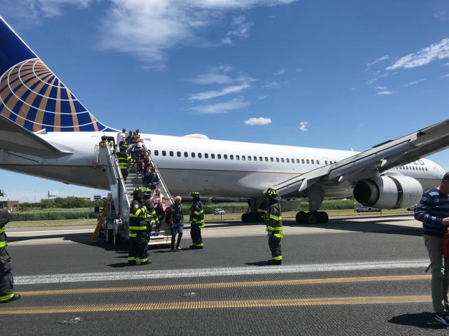 Plane Blows Tires, Skids Down Runway