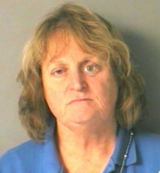 Cops: Woman Pushed Dog Into Lake, Watched It Drown