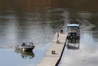 Cops: Drunk Boater Jumps Into Lake, Requests Rescue