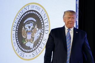 Trump Speaks in Front of Doctored Presidential Seal