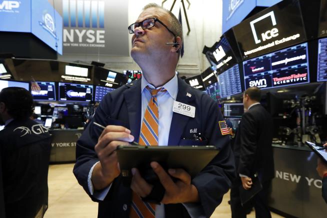 Stocks Retreat From Latest Record Highs