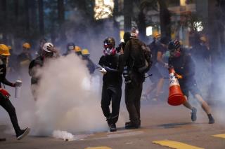 Cops Fire Tear Gas Inside Hong Kong Train Station