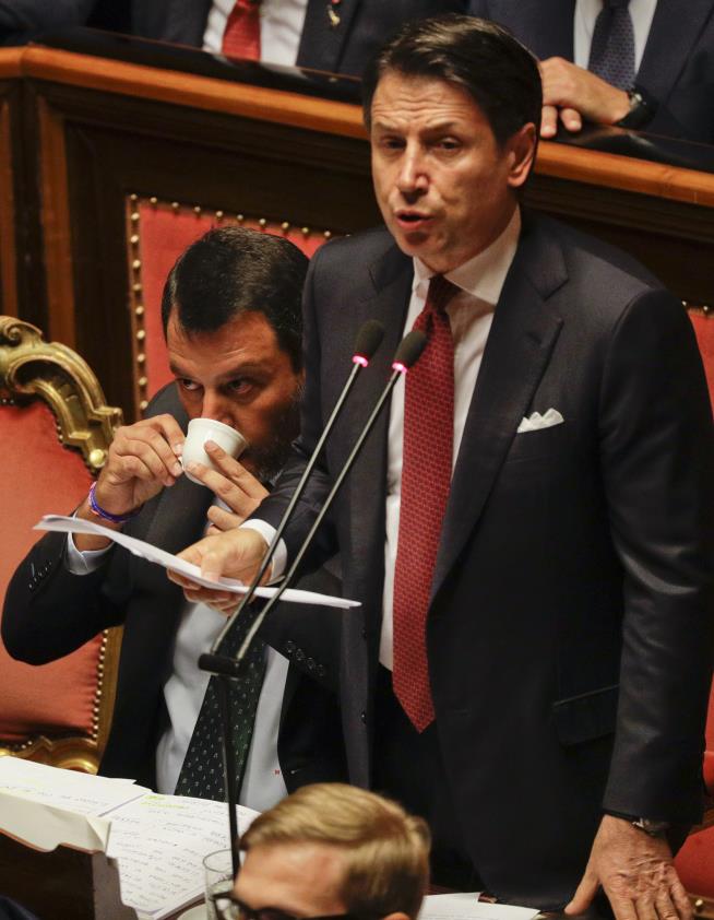 Italian PM Quits, Blames Guy Sitting Next to Him