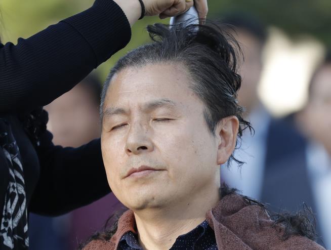Angry S. Korean Politicians Are Shaving Their Heads