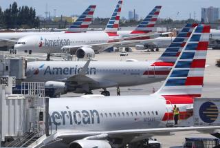 4 Accused of Smuggling $22K on Flight Weren't Passengers