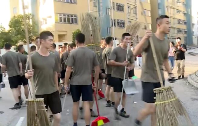 Chinese Troops Finally Emerge in Hong Kong