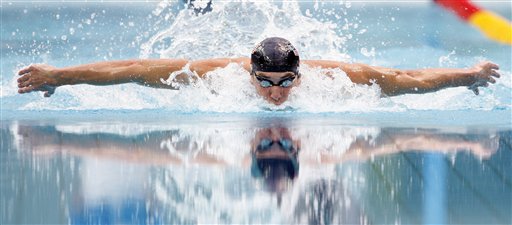 Phelps Ties Spitz With 7 Golds