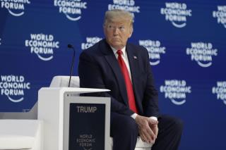 With Trial Set to Resume, Trump Arrives in Davos