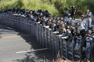 Mexico Breaks Up Migrant Caravan