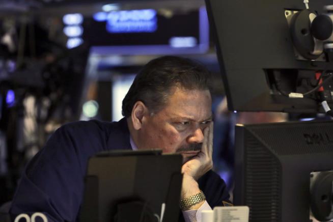 Dow Plunges in Spite of Emergency Rate Cut