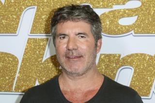 Simon Cowell Breaks Back in Electric Bike Accident