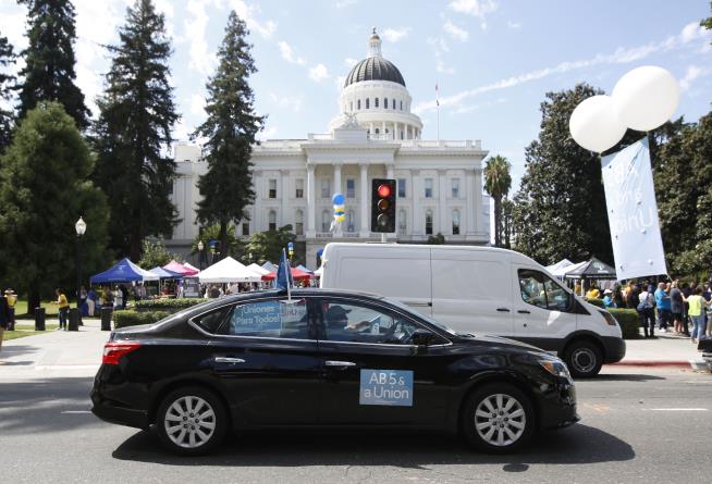 Uber Threatens to Halt Service in California