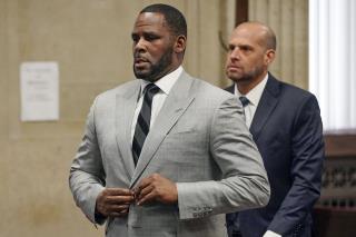 Ex-Manager Charged With Threat Over R. Kelly Doc