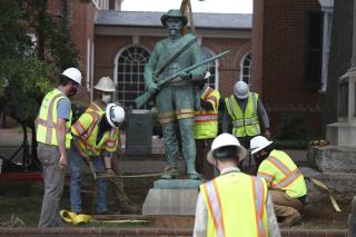Scarred City Removes Statue That Promised 'No Justice Here'