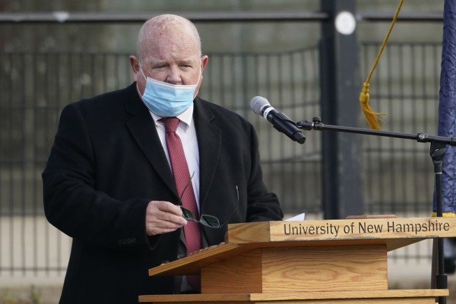 In this Dec. 2 photo, New Hampshire House Speaker Dick Hinch speaks during an outdoor legislative session at the University of New Hampshire in Durham, NH. (AP Photo/Elise Amendola)