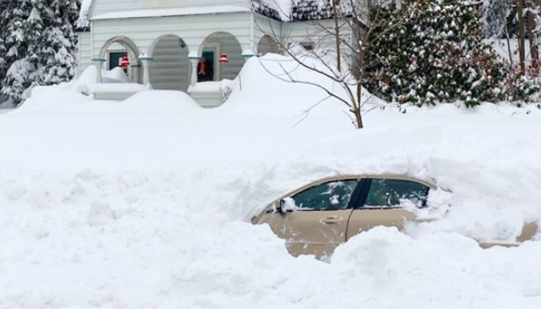 A Snowplow Buried His Car in 4 Feet of Snow. He Was Still in It