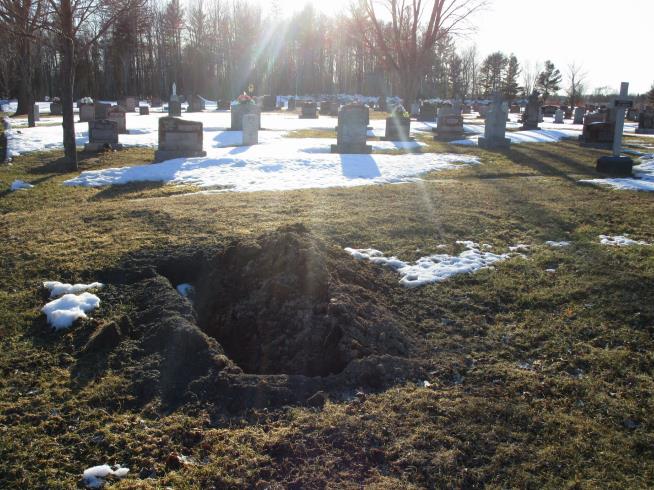 Cemetery Worker Buried Alive in Open Grave