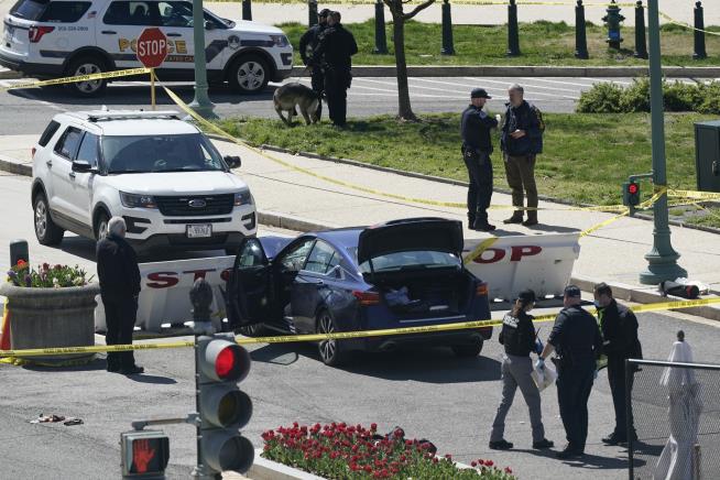 Vehicle Rams Officers Outside US Capitol
