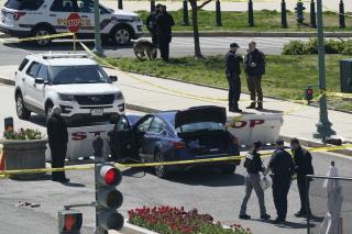 Vehicle Rams Officers Outside US Capitol