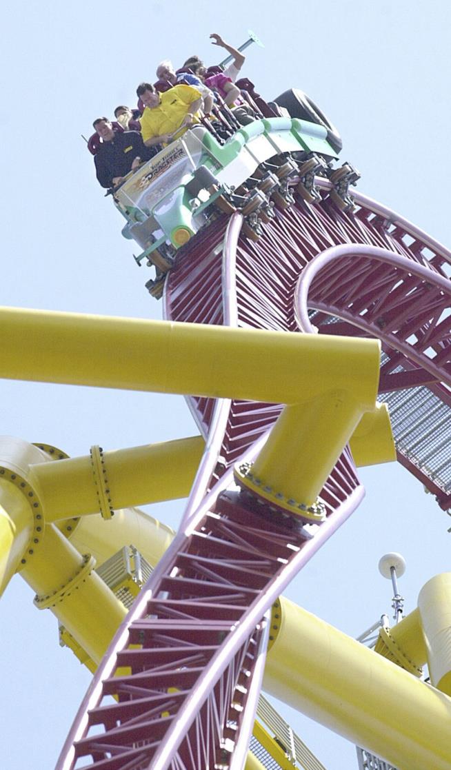 Woman Waiting to Ride Roller Coaster Hit by 'Metal Object'