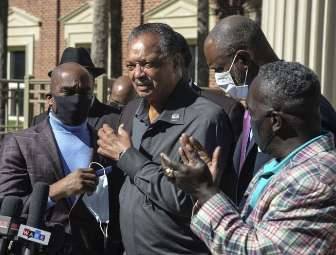 Defense Tries to Oust Jesse Jackson From Courtoom