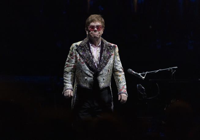 Elton John Cancels Shows After Testing Positive