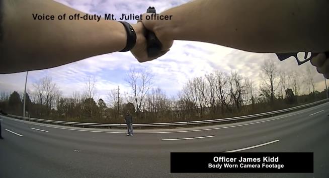 9 Officers Open Fire on Man Standing Along Highway