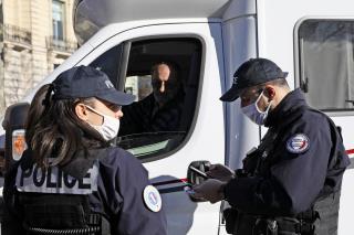 In Paris, Convoy Blocks Champs-Elysees
