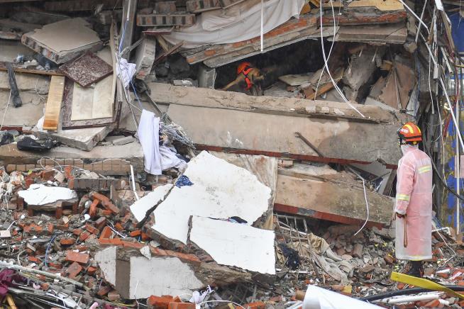 6 Days After Building Collapse, Survivor Pulled From Rubble