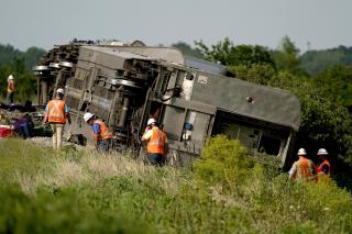 Passenger Train Slams Into Dump Truck, Derails