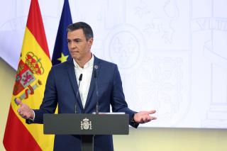 Spain's PM to Workers: Dress Like Me