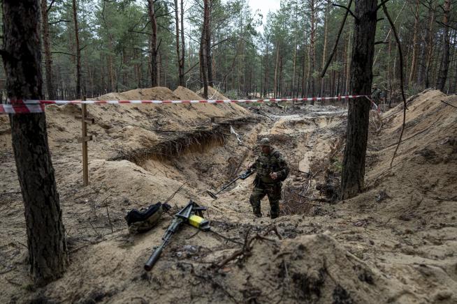 Ukraine Says Mass Burial Site Found Near Liberated City