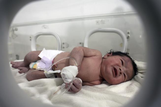 Mother Trapped in Quake Rubble Gives Birth