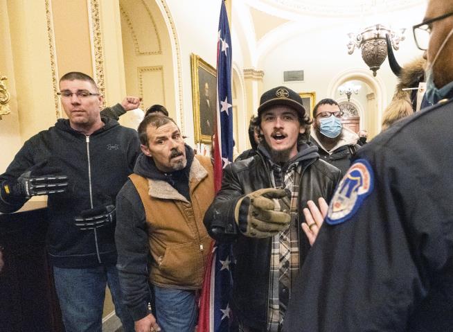 Rioter With Confederate Flag Gets Prison in Capitol Attack