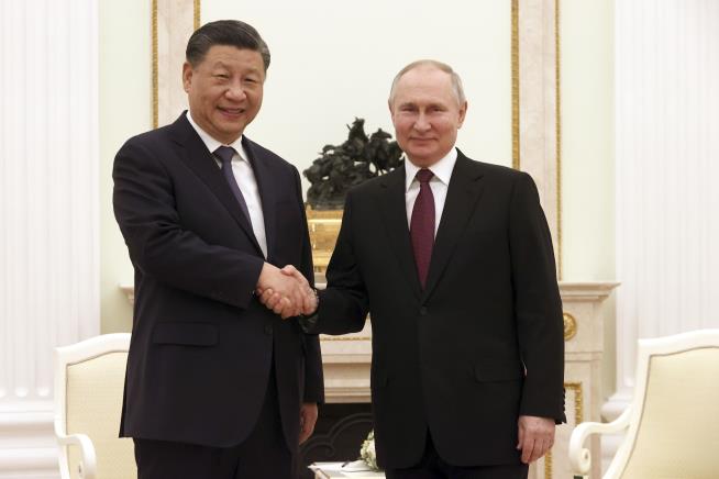 Xi Visits 'Dear Friend' Putin