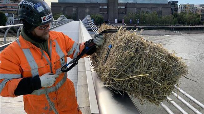 In London, a Hay Bale Must Dangle From This Bridge