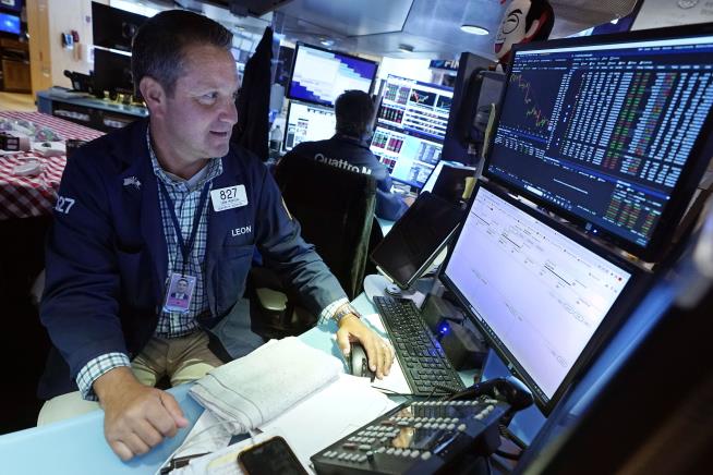 Dow Falls as 10-Year Yield Nears a Milestone