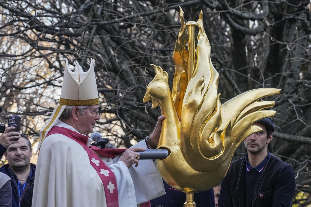 The Tower of Notre Dame Cathedral crowned with a new Golden Rooster as a  Symbol of Rebirth - Sarajevo Times